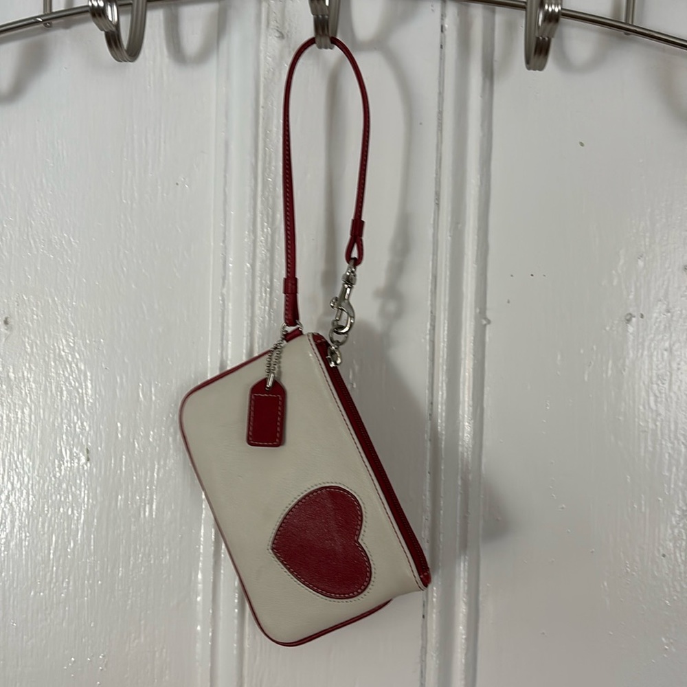 Coach heart wristlet.